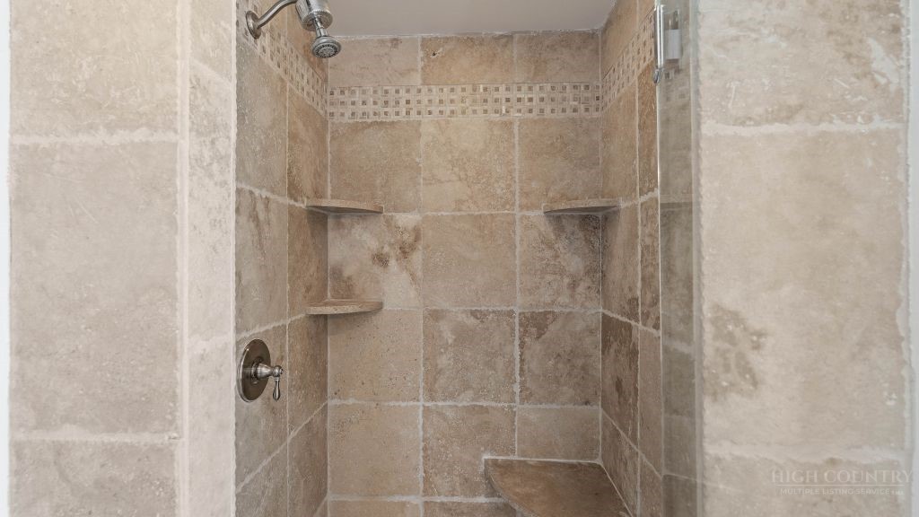 713 Kalmia Lane Boone, NC 28607 - Photo 20 of 50 a bathroom with a shower