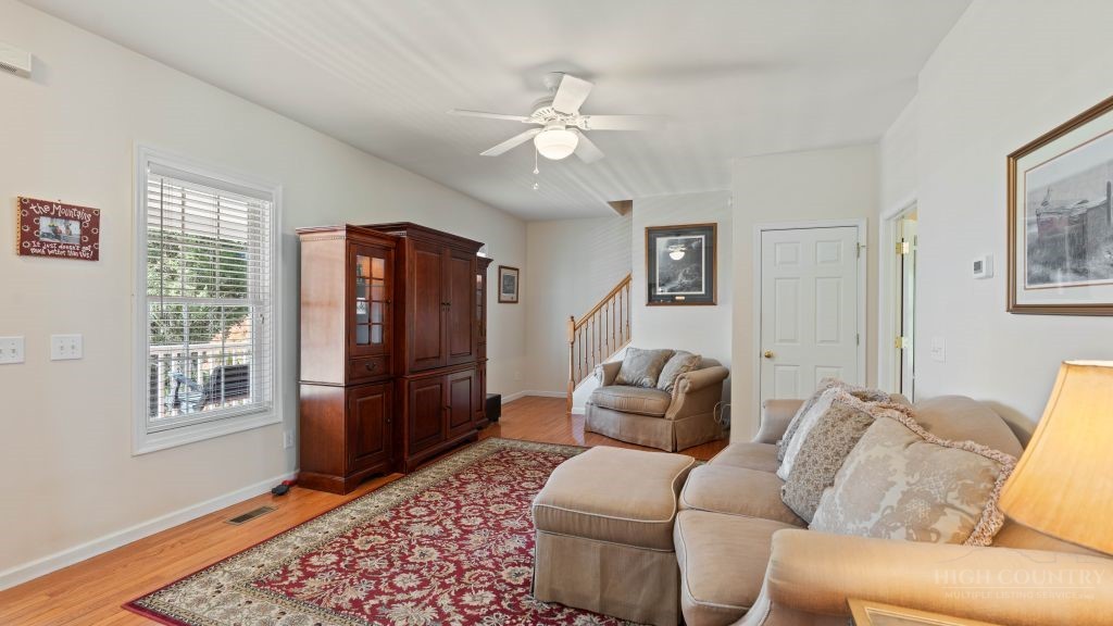 713 Kalmia Lane Boone, NC 28607 - Photo 29 of 50 a living room with furniture and a window