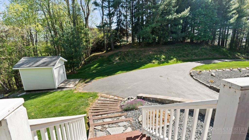 713 Kalmia Lane Boone, NC 28607 - Photo 38 of 50 a view of backyard with outdoor seating and green space