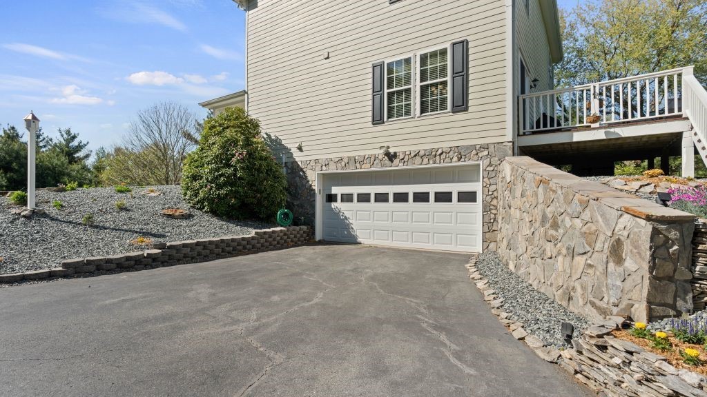 713 Kalmia Lane Boone, NC 28607 - Photo 45 of 50 a front view of a house with a yard