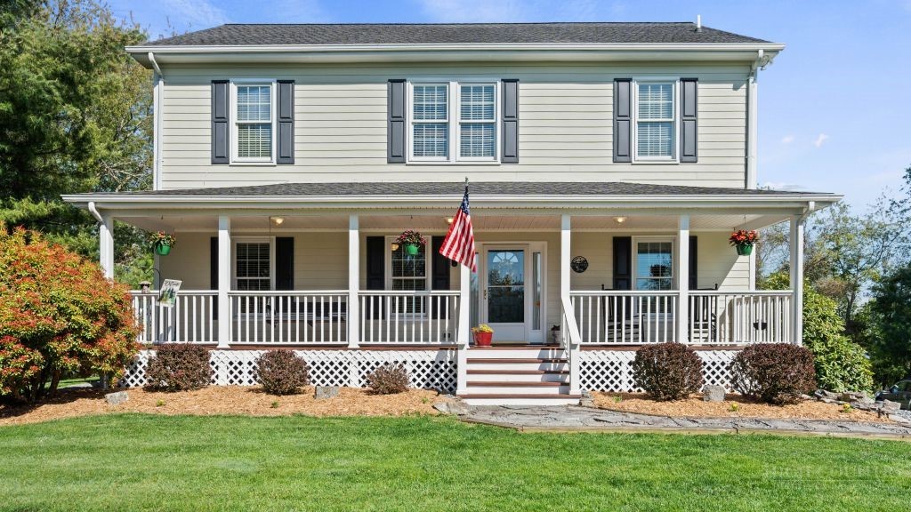 713 Kalmia Lane Boone, NC 28607 - Photo 49 of 50 a front view of a house with a yard