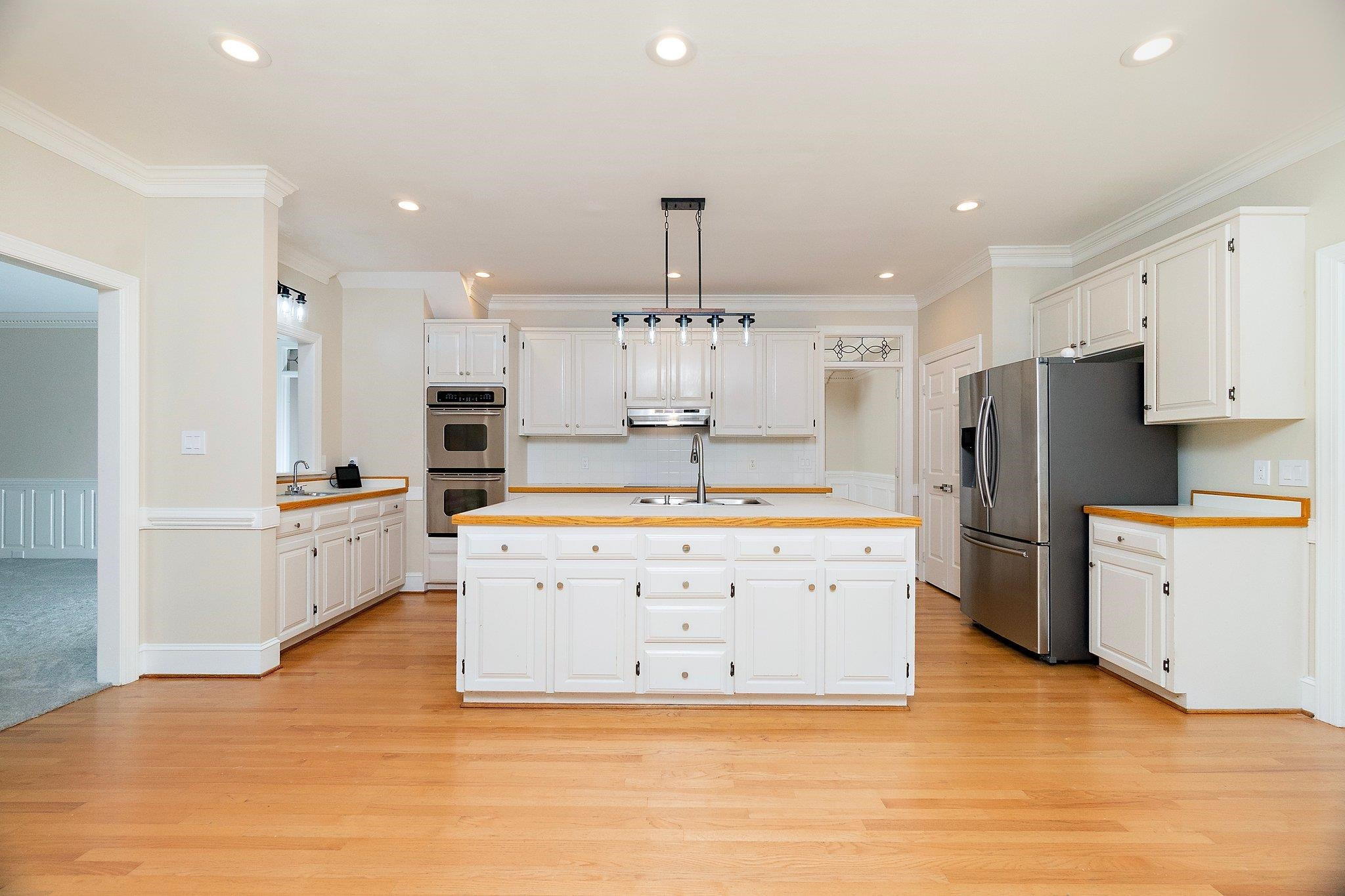 10108 Ethridge Court Raleigh, NC 27615 - Photo 7 of 51 Hardwood Floors Throughout 1st Floor