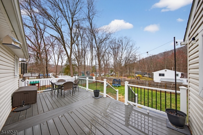5 Birch Road Andover, NJ 07821 - Photo 12 of 41 a view of a patio with couches table and chairs and potted plants