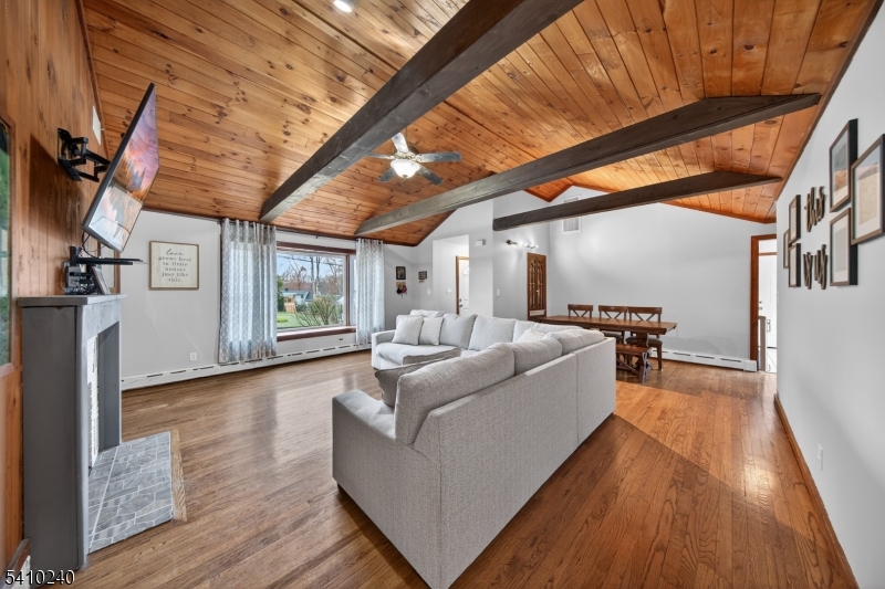 5 Birch Road Andover, NJ 07821 - Photo 20 of 41 a living room with furniture and a wooden floor