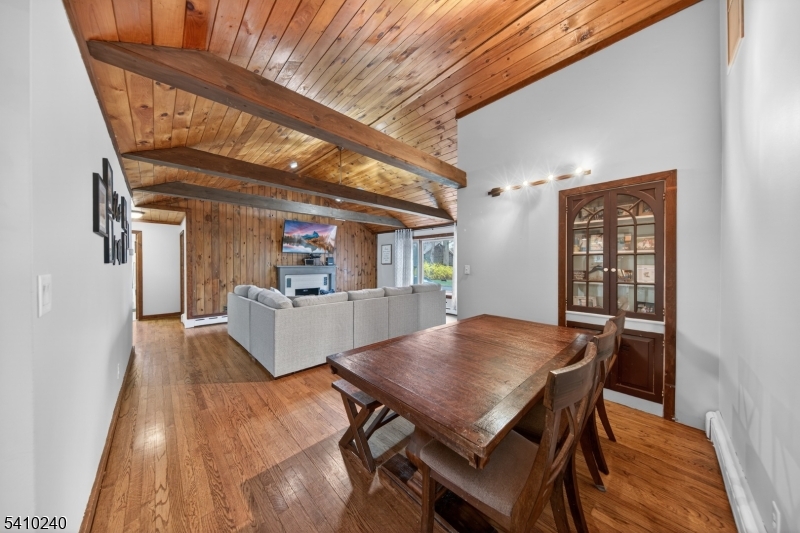 5 Birch Road Andover, NJ 07821 - Photo 23 of 41 a view of a dining room with furniture and wooden floor