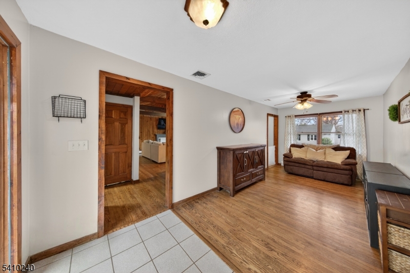 5 Birch Road Andover, NJ 07821 - Photo 30 of 41 a view of a livingroom with furniture and wooden floor