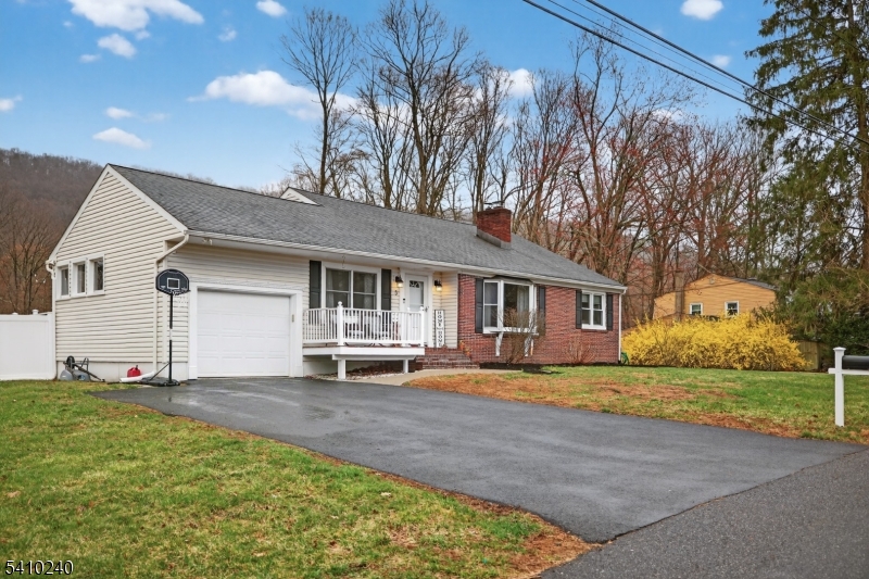 5 Birch Road Andover, NJ 07821 - Photo 6 of 41 a view of a house with a patio