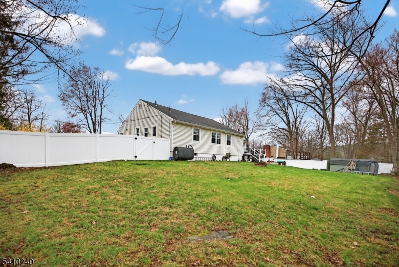 5 Birch Road Andover, NJ 07821 - Photo 8 of 41 a view of a house with a yard
