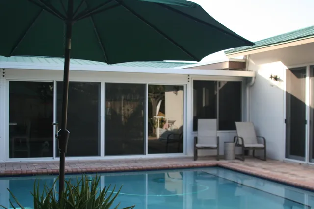 a bathroom with a sink toilet and mirror