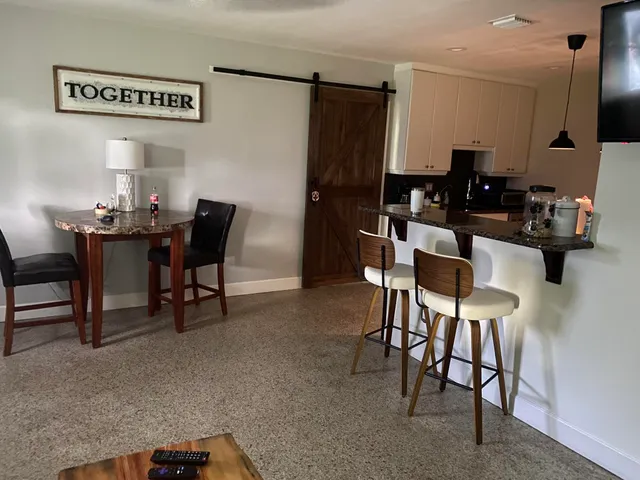 a view of walk in closet with clothes