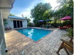 a living room with furniture and a gate