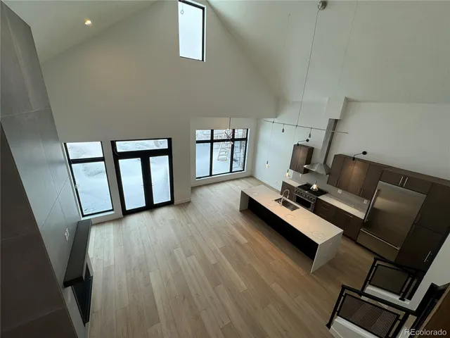 a room with furniture and wooden floor