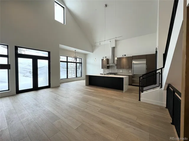 a view of kitchen with furniture and large window