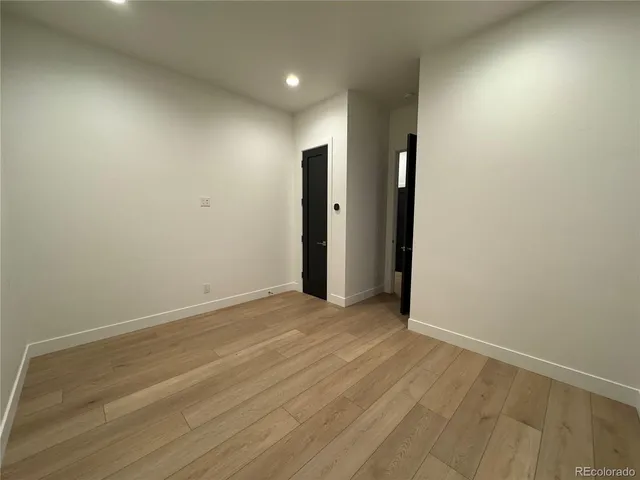 an empty room with an entryway