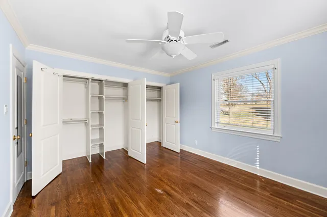 a bathroom with a tub shower and sink