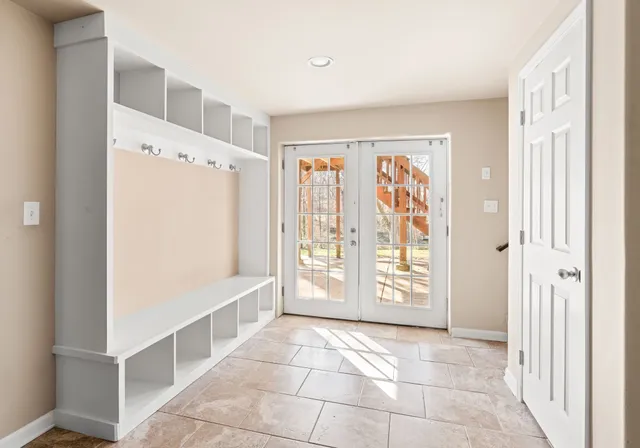 a view of entryway with wooden floor