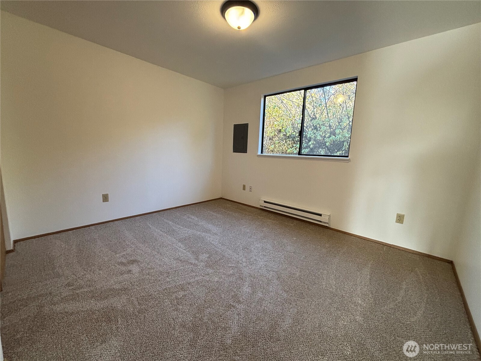 2638 Cascade Trail, Unit A Bremerton, WA 98310 - Photo 11 of 13 an empty room with windows