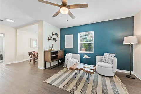 a living room with furniture and a table