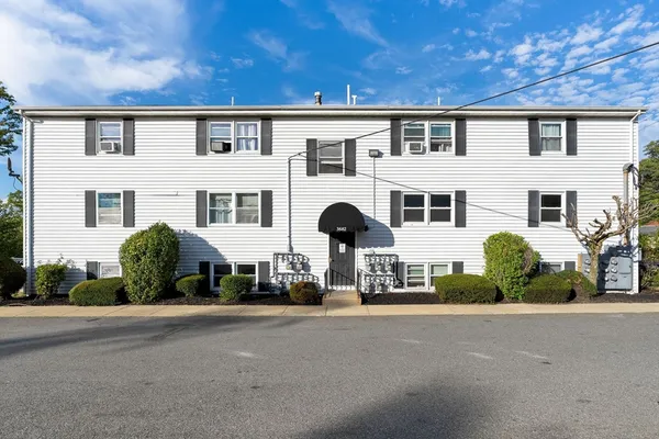 front view of a building with a street