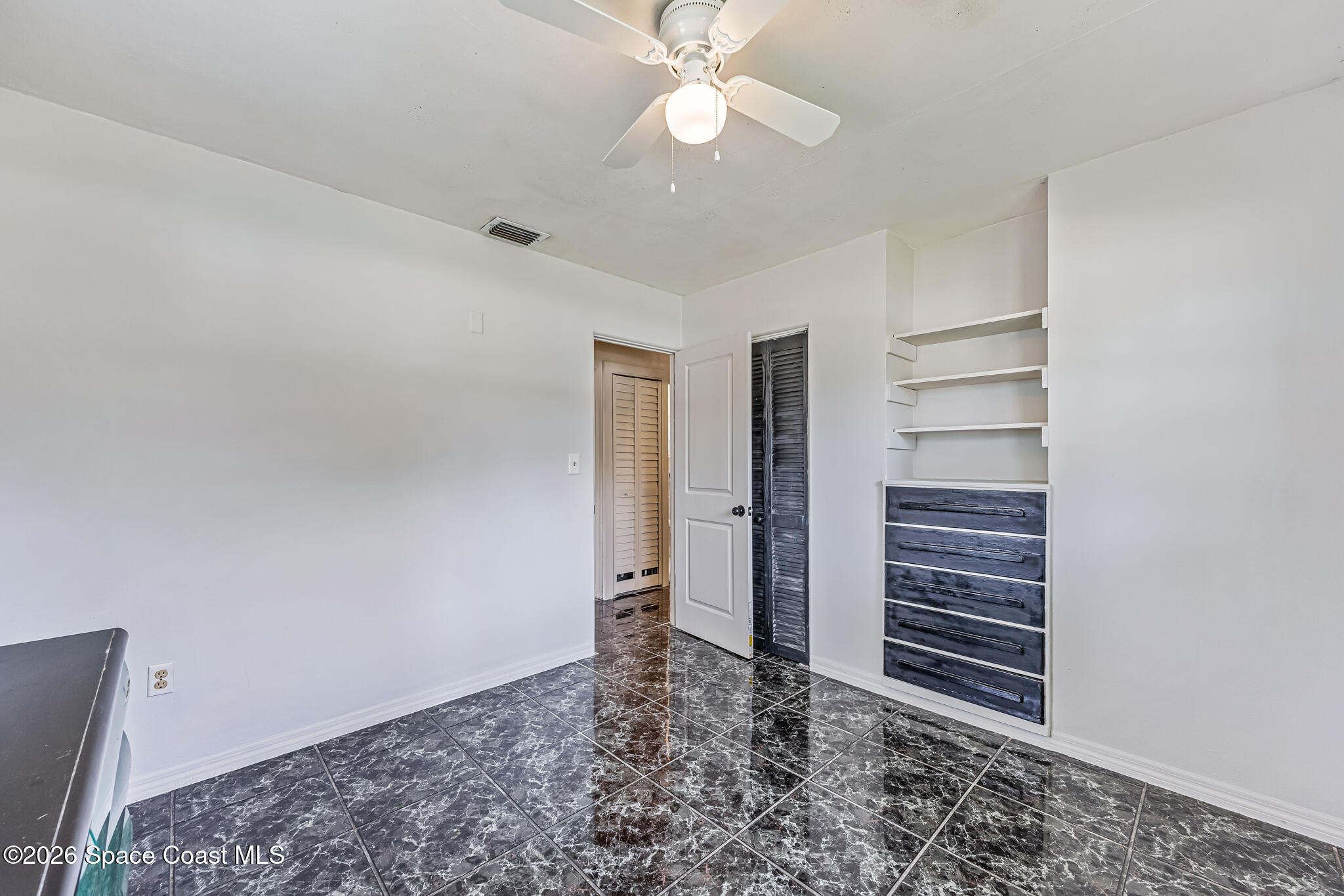 2244 Post Road Melbourne, FL 32935 - Photo 15 of 31 Primary Bedroom