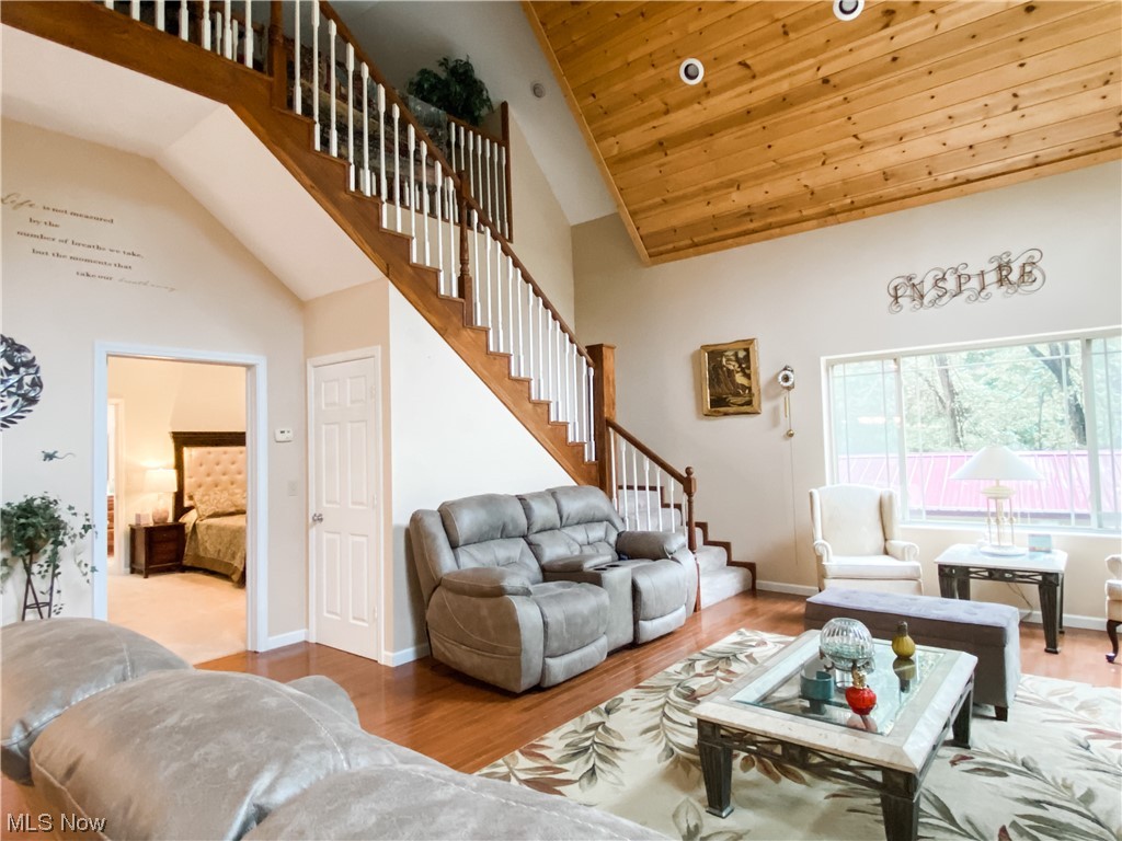 853 Beeson Run Road Walker, WV 26180 - Photo 10 of 26 Living room angle looking at stairs to loft and owner's suite ...