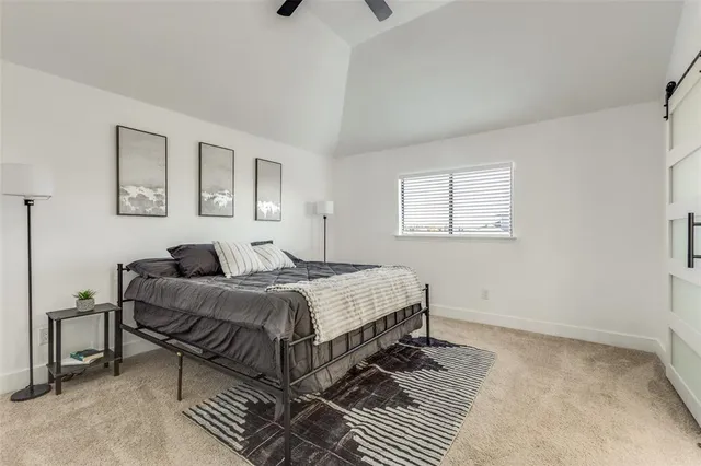 a bed room with bed and a window