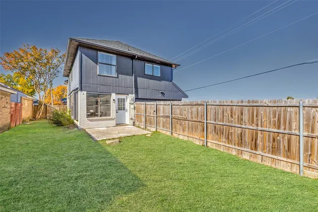 a view of backyard with deck
