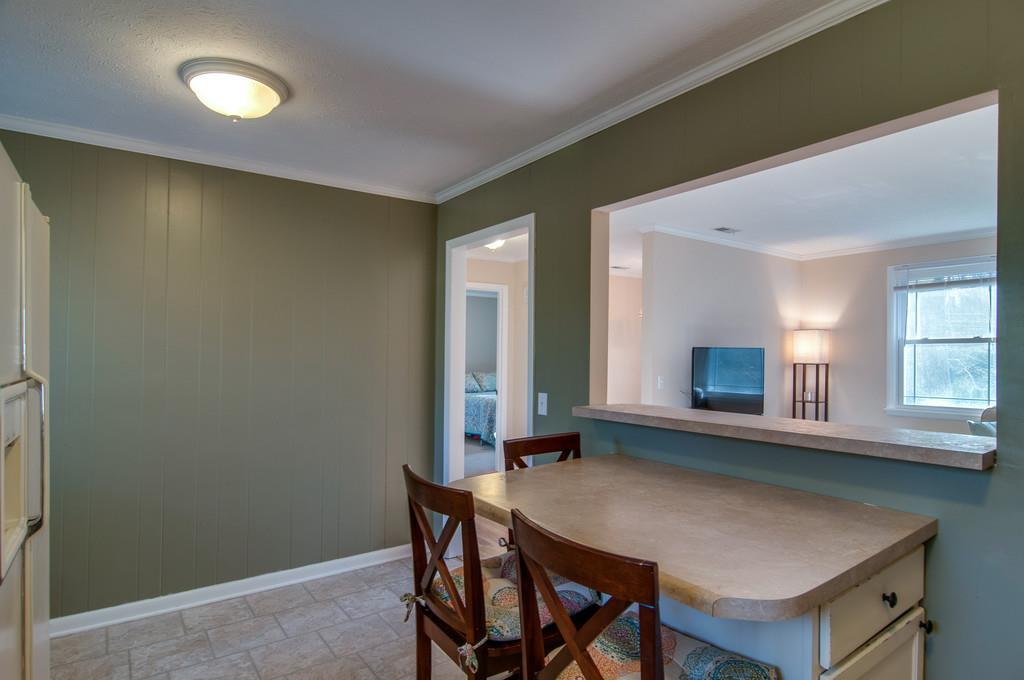 7709 Chester Road Fairview, TN 37062 - Photo 16 of 29 a view of kitchen with furniture and window