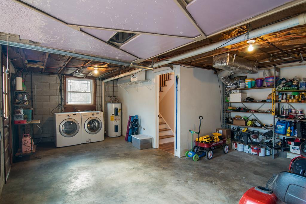 7709 Chester Road Fairview, TN 37062 - Photo 22 of 29 a view of a storage room with a lot of stuff