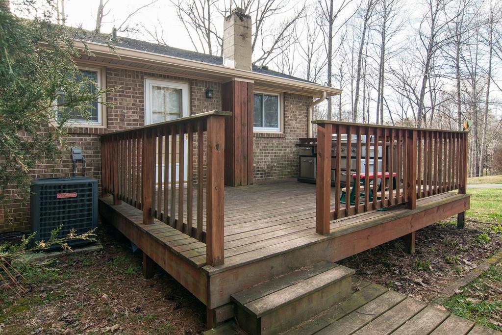 7709 Chester Road Fairview, TN 37062 - Photo 24 of 29 a view of a house with wooden fence