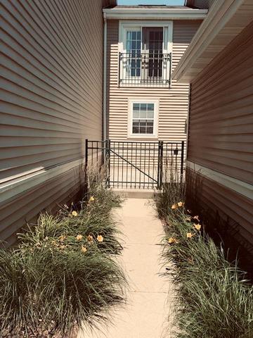1502 Remington Lane Round Lake, IL 60073 - Photo 2 of 29 a view of a house with a yard