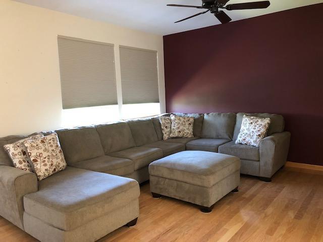 1502 Remington Lane Round Lake, IL 60073 - Photo 14 of 29 a living room with furniture and a window