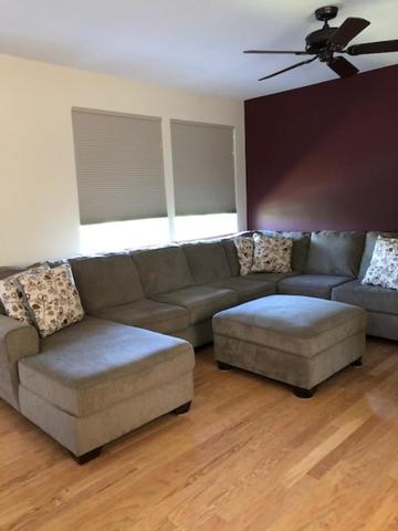 1502 Remington Lane Round Lake, IL 60073 - Photo 15 of 29 a living room with couches and a coffee table