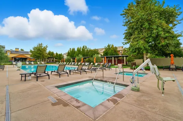 a view of a swimming pool with a slide