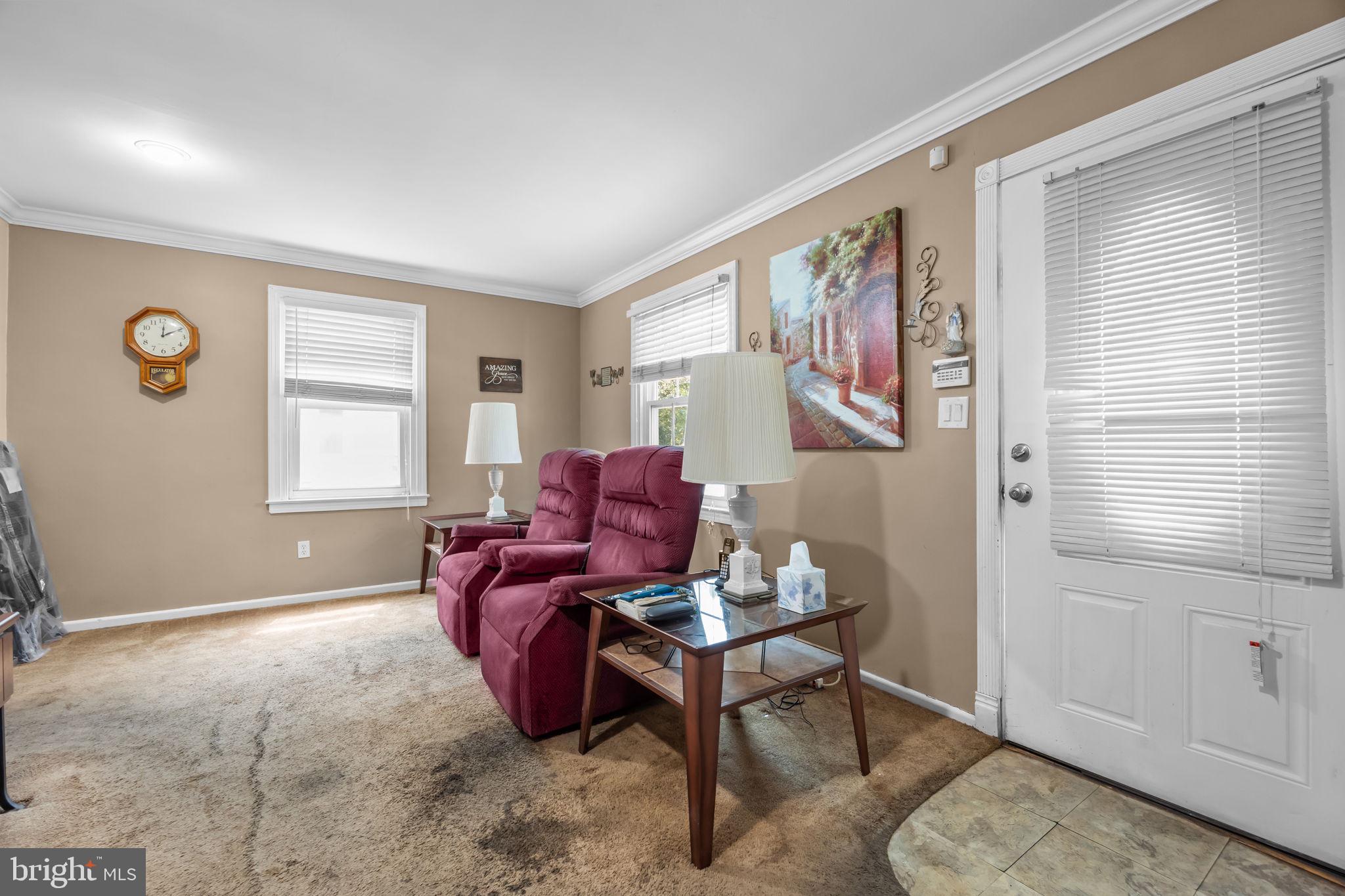 16 James Road Hatboro, PA 19040 - Photo 5 of 22 a living room with furniture and a window