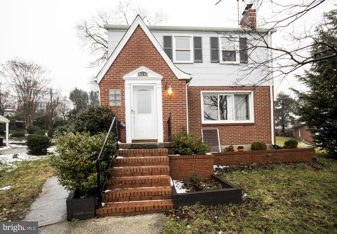 8216 Edwill Avenue Rosedale, MD 21237 - Photo 2 of 27 a front view of a house with plants and trees