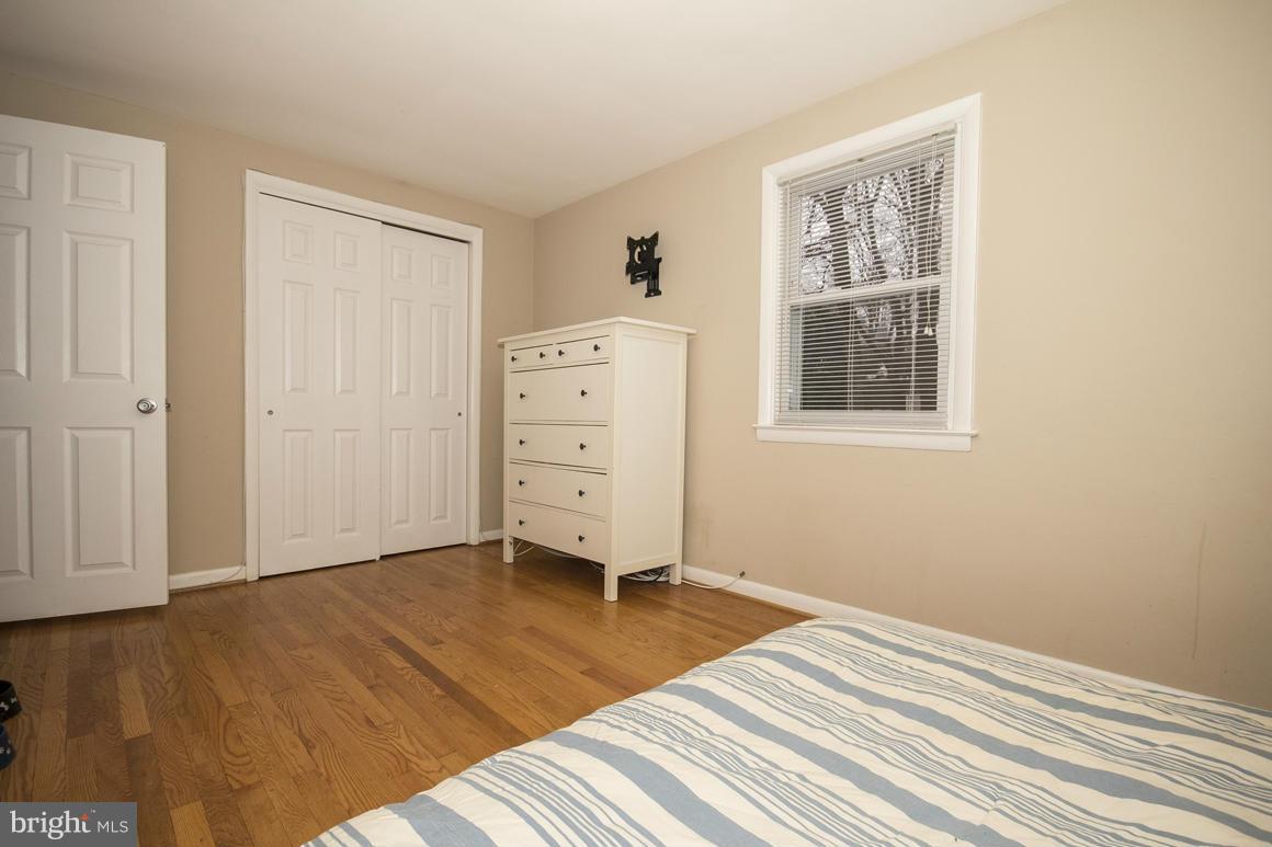 8216 Edwill Avenue Rosedale, MD 21237 - Photo 15 of 27 an empty room with windows and closet