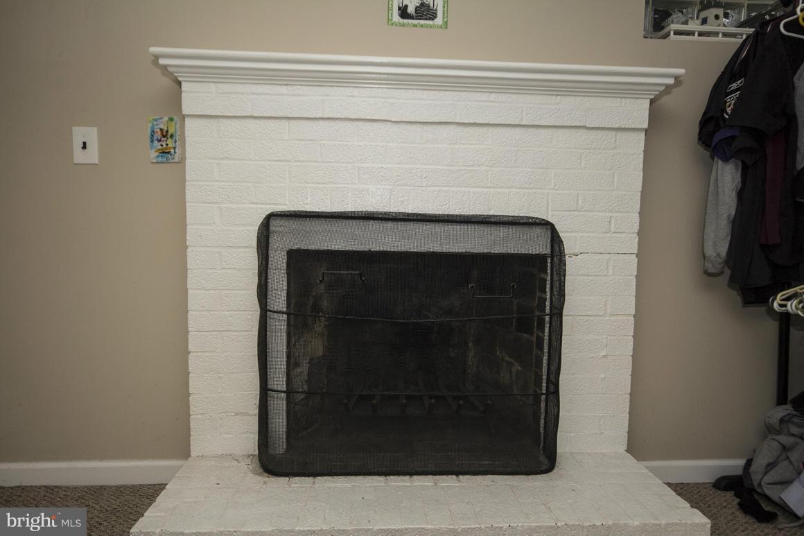 8216 Edwill Avenue Rosedale, MD 21237 - Photo 22 of 27 a close view of a fireplace