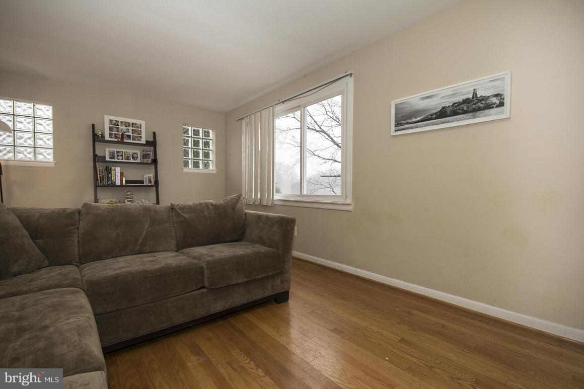 8216 Edwill Avenue Rosedale, MD 21237 - Photo 4 of 27 a living room with furniture and a window