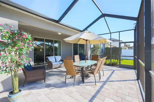 a front view of house with yard and trees