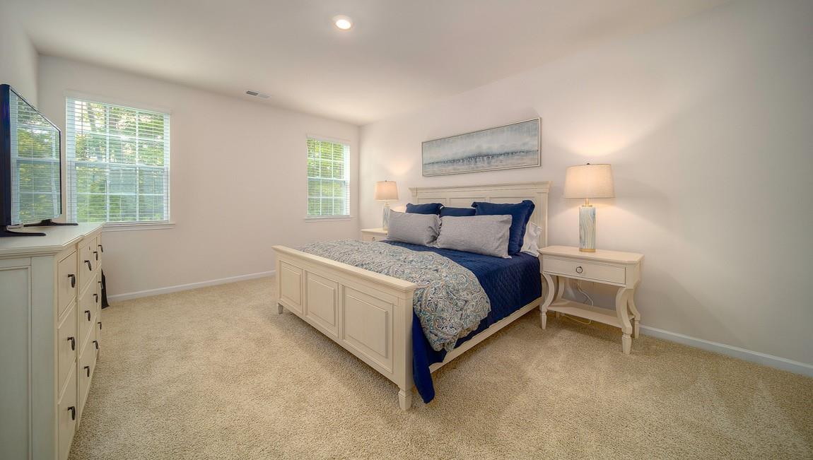 1208 Secrest Cmns Drive Monroe, NC 28112 - Photo 22 of 40 a bedroom with a bed and a window