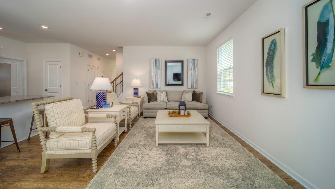 1208 Secrest Cmns Drive Monroe, NC 28112 - Photo 9 of 40 a living room with furniture and a rug