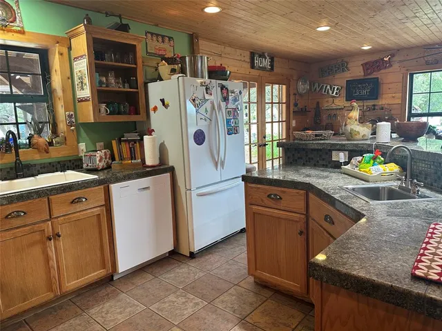 a bedroom with furniture and a potted plant