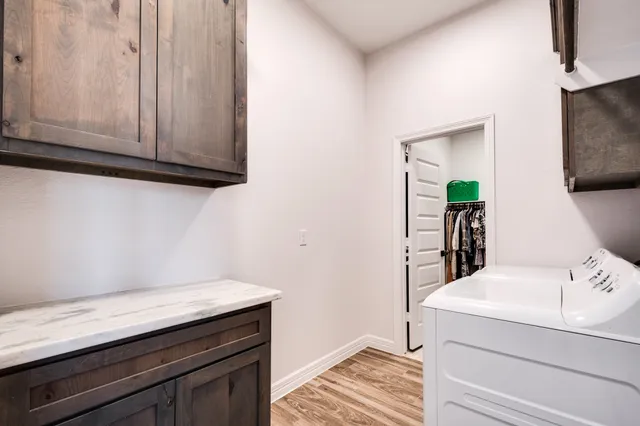 a utility room with washer and dryer