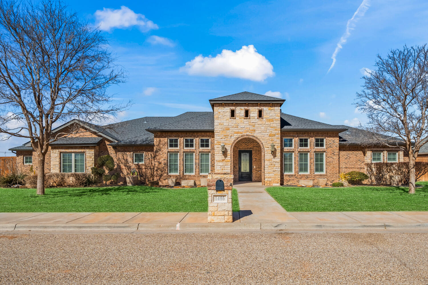 1405 11th Place Shallowater, TX 79363 - Photo 1 of 81 a front view of a house with a yard