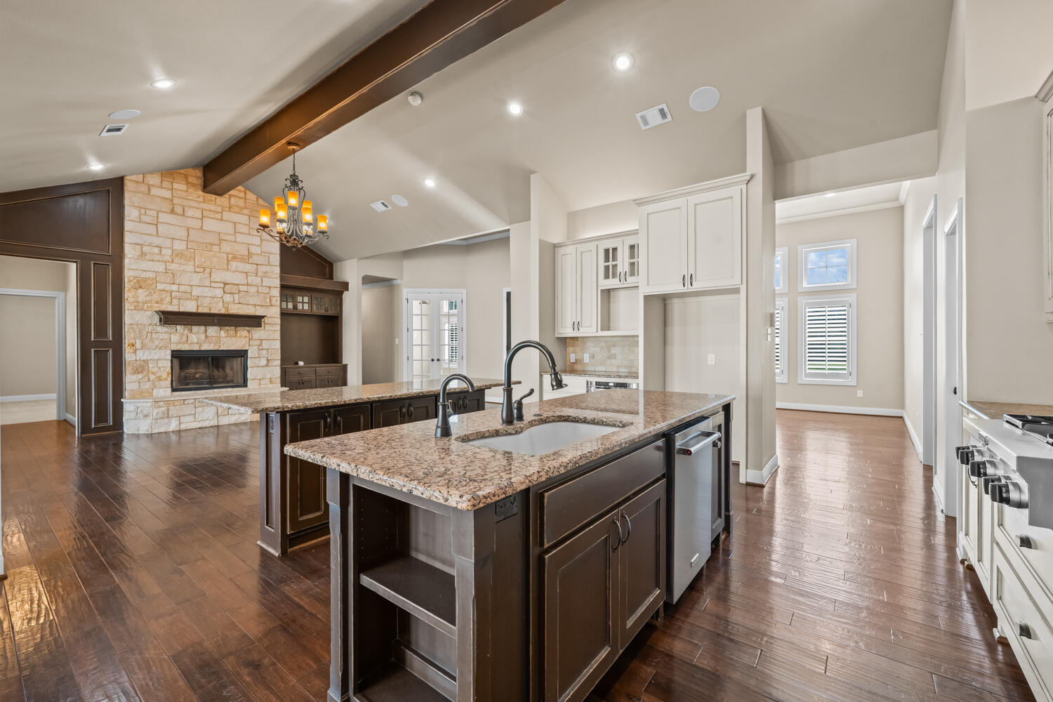 1405 11th Place Shallowater, TX 79363 - Photo 16 of 81 a kitchen with sink stove and refrigerator