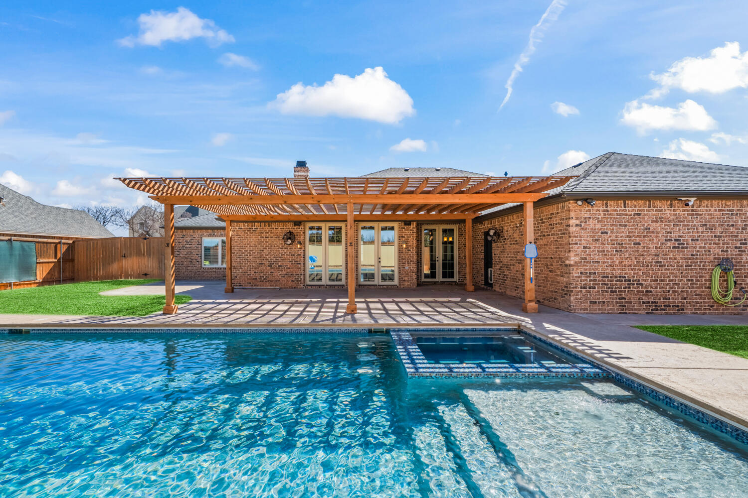 1405 11th Place Shallowater, TX 79363 - Photo 2 of 81 a view of a house with a yard