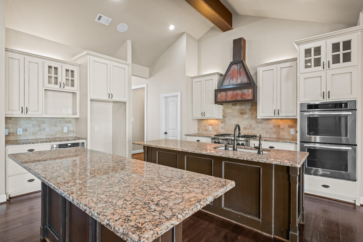1405 11th Place Shallowater, TX 79363 - Photo 21 of 81 a kitchen with stainless steel appliances granite countertop a sink stove and refrigerator
