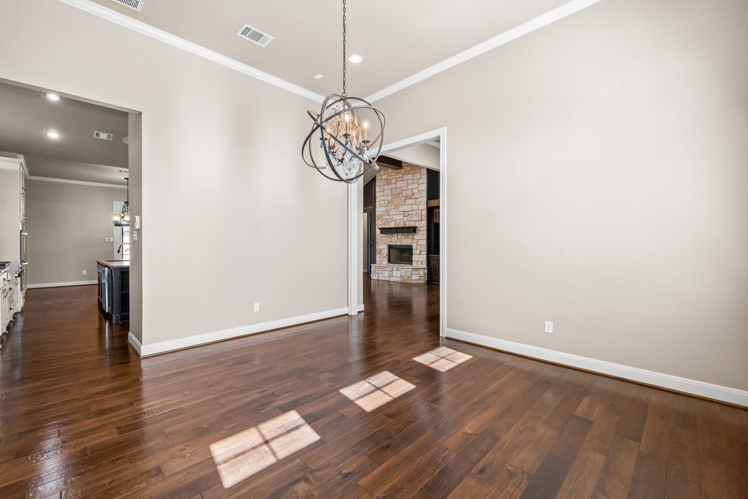 1405 11th Place Shallowater, TX 79363 - Photo 24 of 81 a view of empty room with wooden floor