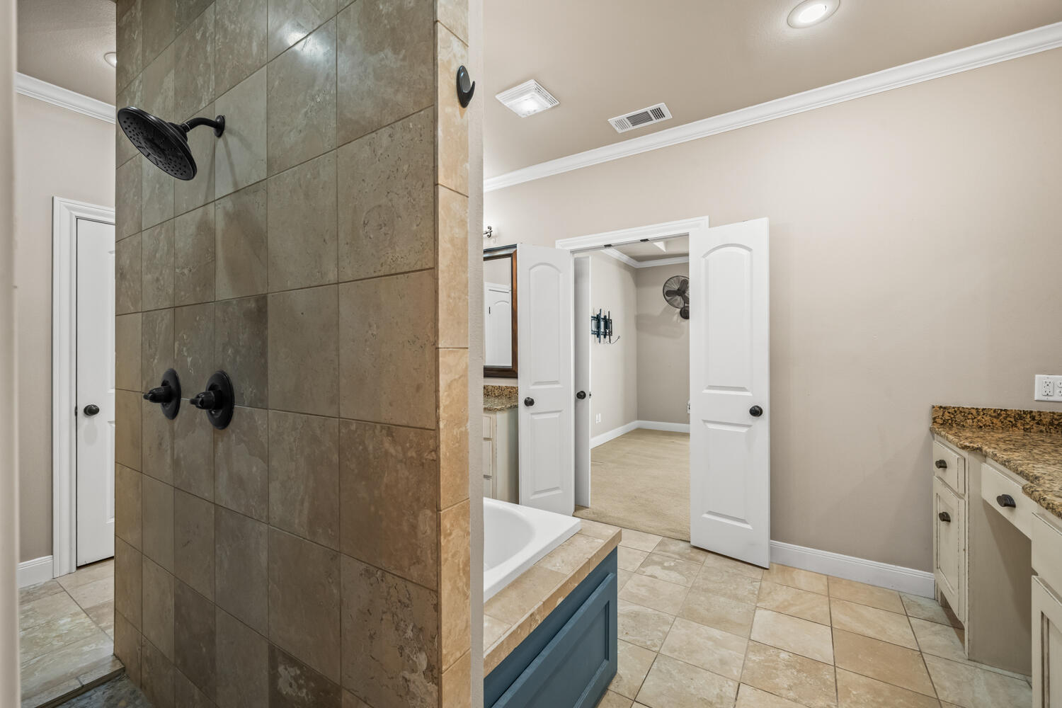 1405 11th Place Shallowater, TX 79363 - Photo 36 of 81 a bathroom with a sink and shower